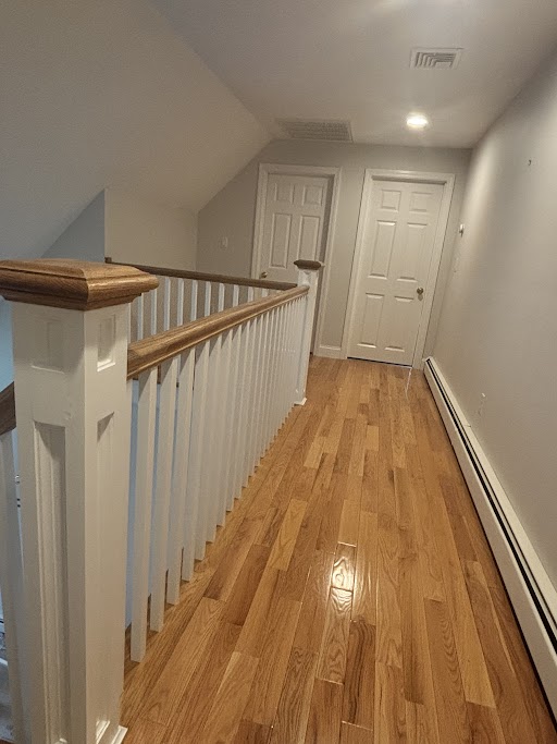 Hardwood flooring with custom staircase railing